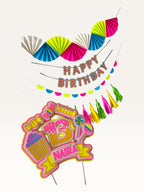 Paper Party Studio neon candy birthday decoration set with personalised cake topper, banners, and paper tassels.