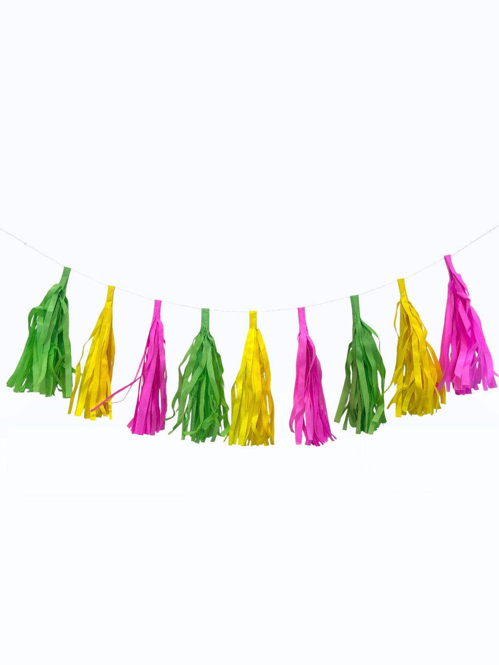 Paper Party Studio neon paper tassel garland in bright pink, yellow, and green for candy-themed birthday parties