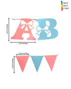 Paper Party Studio Oh Baby banner with pink and blue cardstock letters featuring bow cut-outs and triangle pennants.