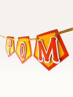 Paper Party Studio Om Namah Shivaya banner with saffron pentagon flags, red borders, and trishul accents.