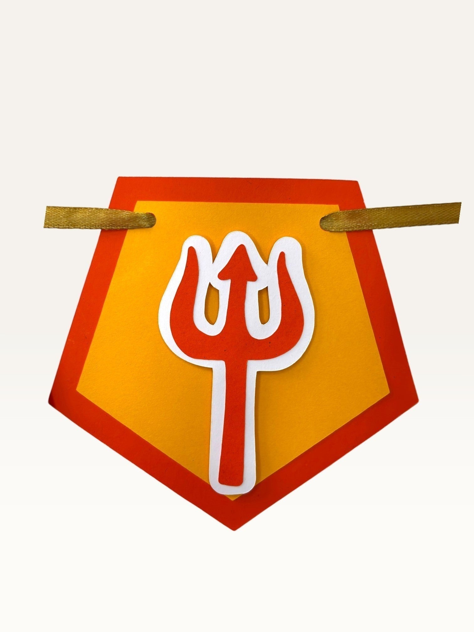Paper Party Studio saffron pentagon banner flag with a red trishul accent for Shivratri pooja home decor.