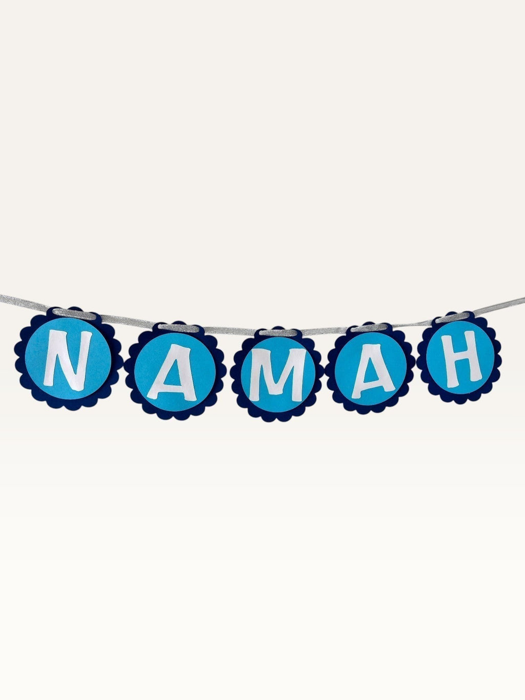 Paper Party Studio blue scalloped cardstock bunting spelling Namah for Mahashivratri and pooja home decor.