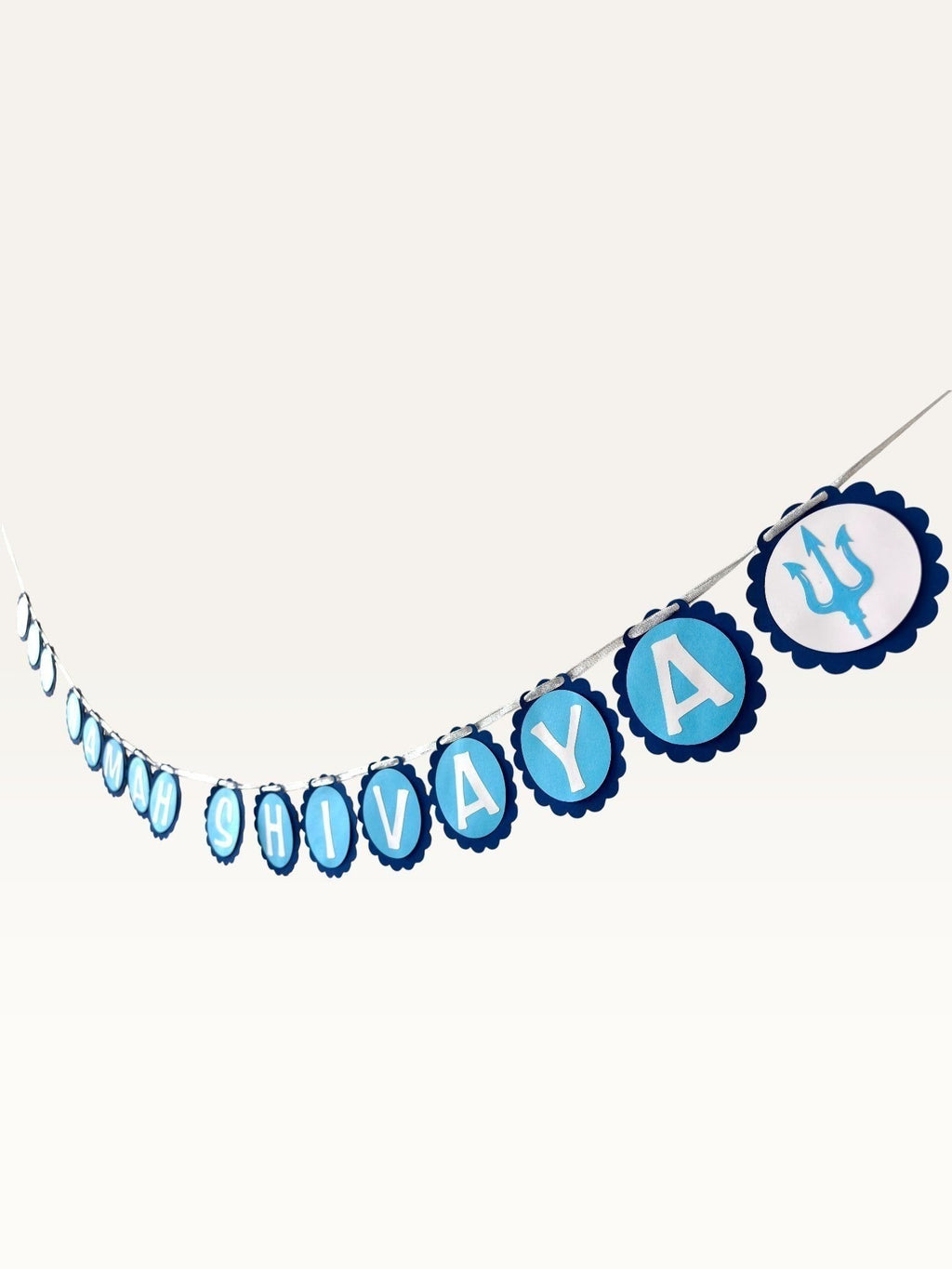 Paper Party Studio Om Namah Shivaya blue cardstock bunting with scalloped medallions and trishul accents for pooja.