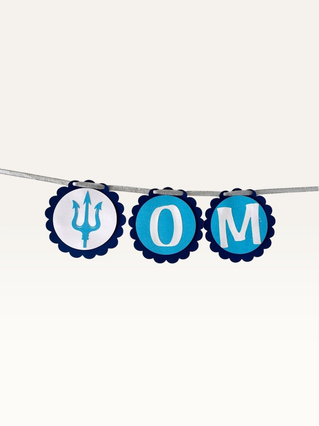 Paper Party Studio blue scalloped cardstock bunting with Om Namah Shivaya letters and trishul accents for pooja decor