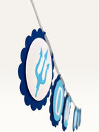 Paper Party Studio Om Namah Shivaya bunting with blue scalloped cardstock medallions and trishul accents for pooja.