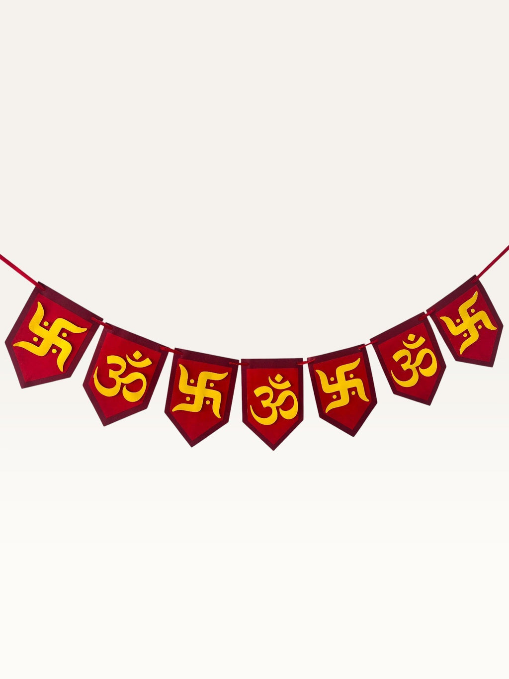 Paper Party Studio red and yellow paper pennant banner featuring traditional Om and Swastik motifs for Diwali decor