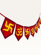 Paper Party Studio red and yellow cardstock bunting with Om and Swastik symbols for Diwali and festive home decor.