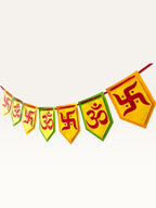 Paper Party Studio Om and Swastik bunting with yellow and green pentagon flags on a red cord for festive decor.