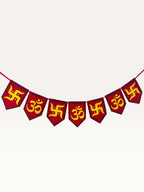 Paper Party Studio Om and Swastik bunting with red and yellow pentagon flags for festive home decoration.