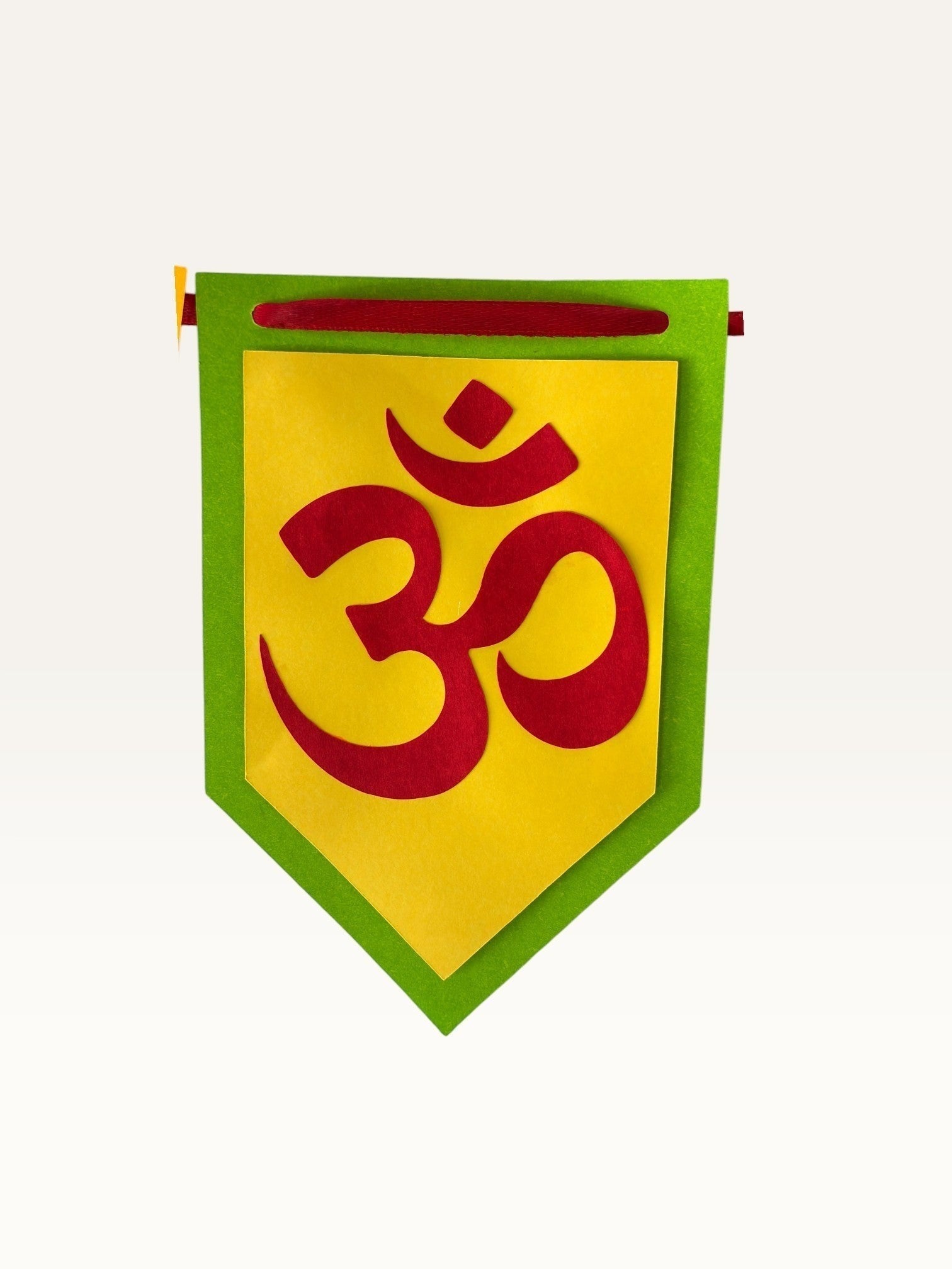 Paper Party Studio Om symbol bunting flag made of layered yellow and green cardstock for festive home decoration.