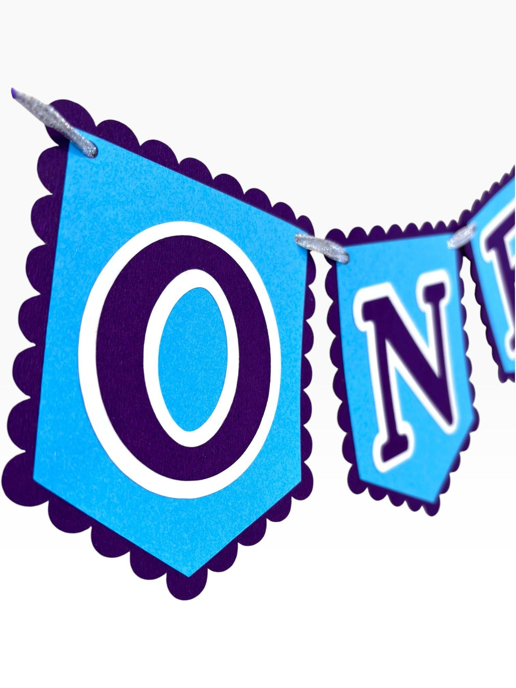 Paper Party Studio blue scalloped ONE banner for first birthday, perfect for highchair or cake smash photos.