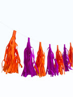 Paper Party Studio handmade orange and purple tissue paper tassel garland for party decorations and backdrops.