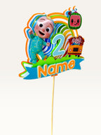 Paper Party Studio personalised sing-along baby cake topper with rainbow, bus, and number 2, made from cardstock.