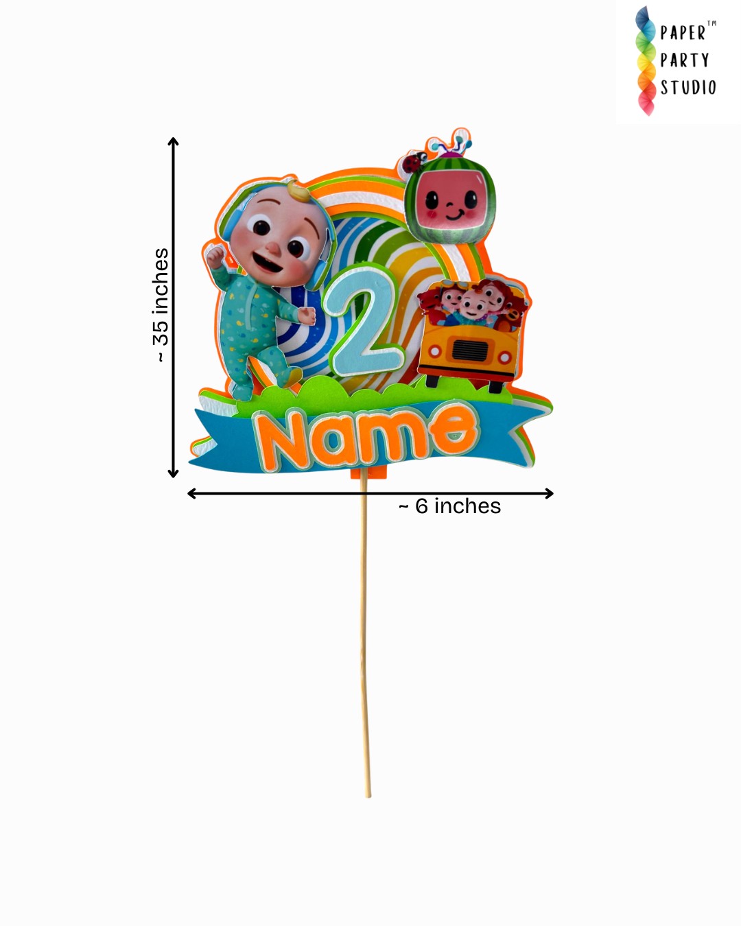 Paper Party Studio personalised sing-along baby cake topper with rainbow, bus, and number 2, made from cardstock.