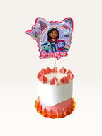 Paper Party Studio personalised cake topper featuring a dollhouse kitten theme with the name Anaya on a birthday cake