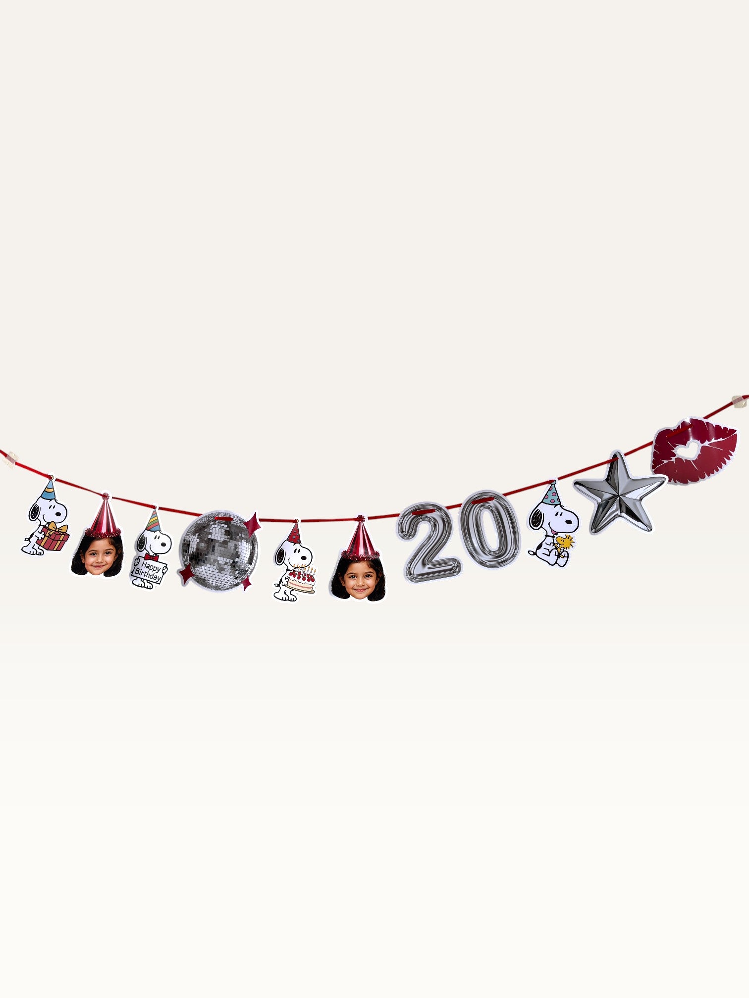 Paper Party Studio custom birthday garland featuring photo cut-outs, a cartoon dog, disco ball and number 20.