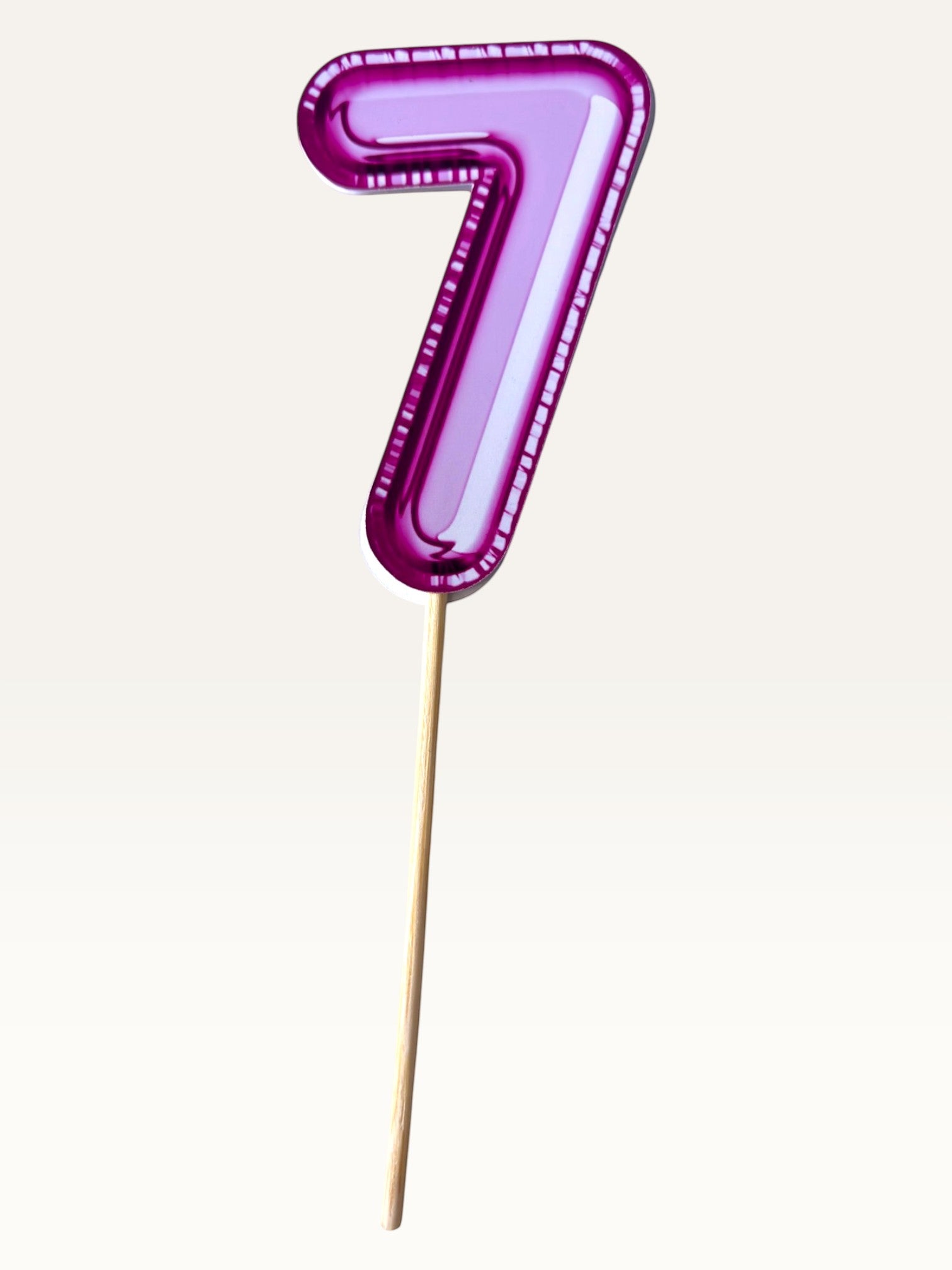 Paper Party Studio glossy pink foil number 7 cake topper on a bamboo stick for birthday celebrations