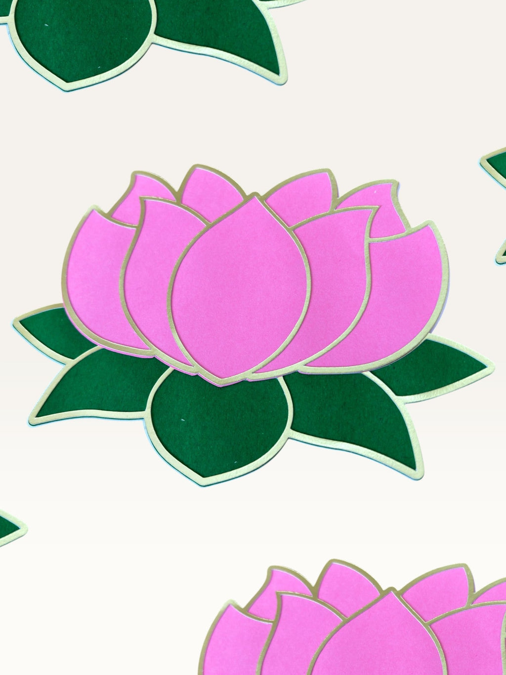 Paper Party Studio layered pink paper lotus flower with gold outline and deep green leaves for festive decor