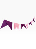 Paper Party Studio handmade paper bunting with alternating soft pink and deep purple triangular pennant flags.