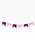 Paper Party Studio handmade paper bunting with alternating soft pink and deep purple pennant flags for celebrations.