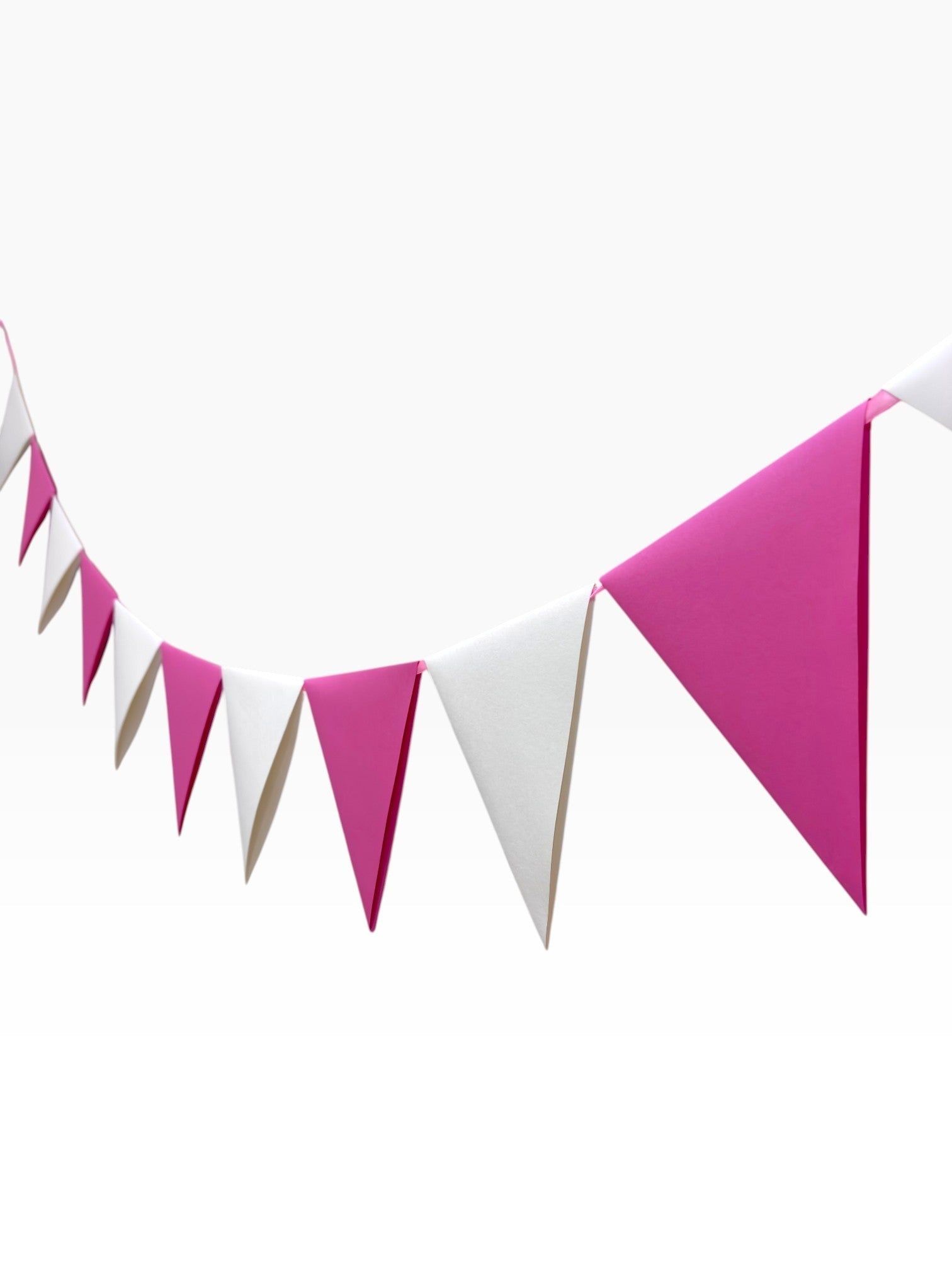 Paper Party Studio pink and white cardstock pennant bunting with classic triangle design, strung on cord.
