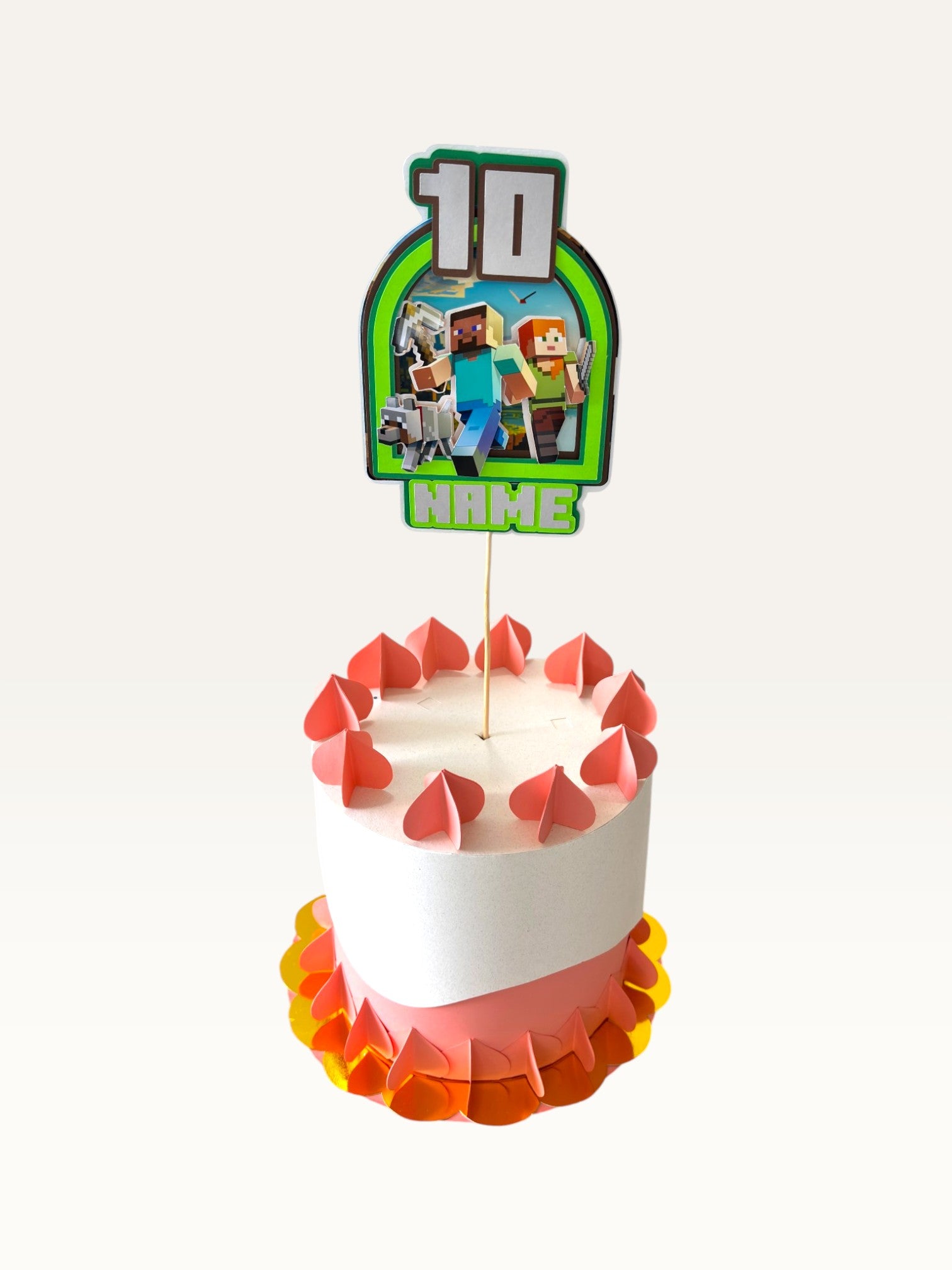 Paper Party Studio personalised pixel block world cake topper with gaming characters and age 10 on a white cake