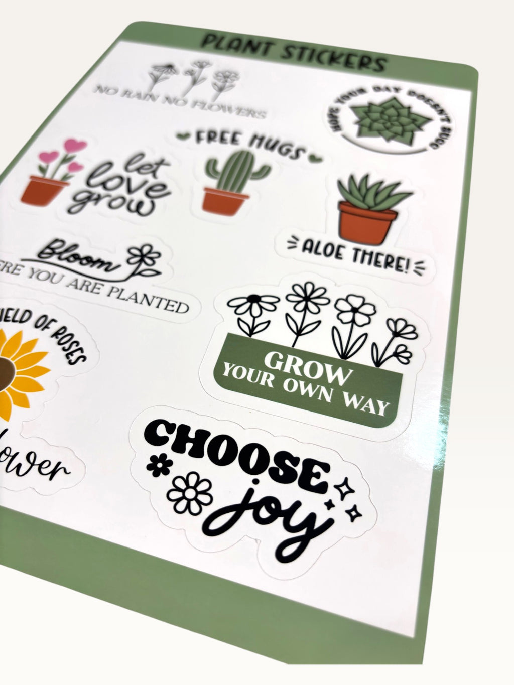 Paper Party Studio plant-themed glossy sticker sheet featuring floral designs and motivational quotes.