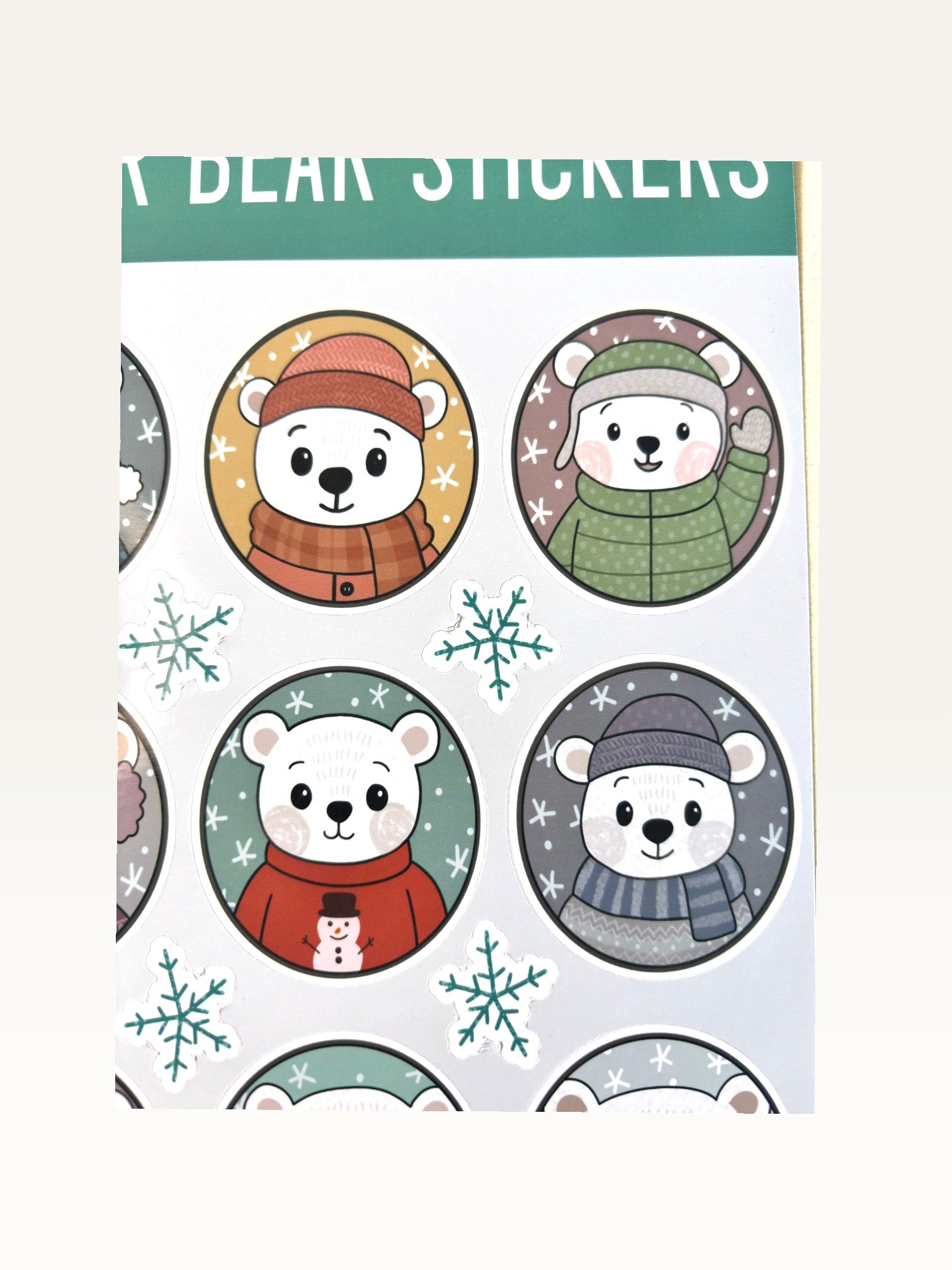 Paper Party Studio polar bear sticker sheet featuring cute bears in winter hats and sweaters with snowflake accents.