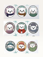 Paper Party Studio polar bear sticker sheet featuring nine cute bears in winter hats and sweaters with snowflake accents.