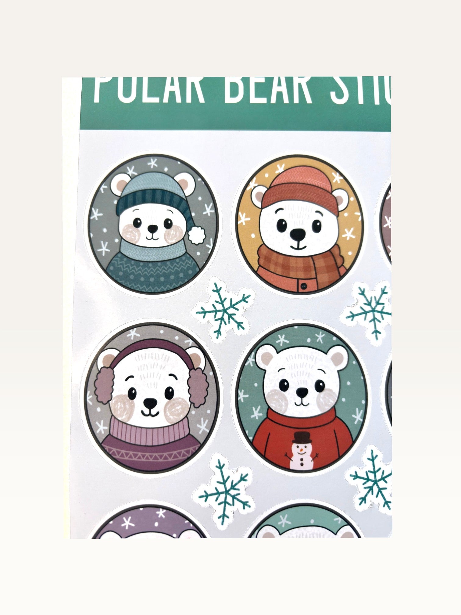 Paper Party Studio polar bear sticker sheet featuring cute bears in winter hats and sweaters with snowflake accents.