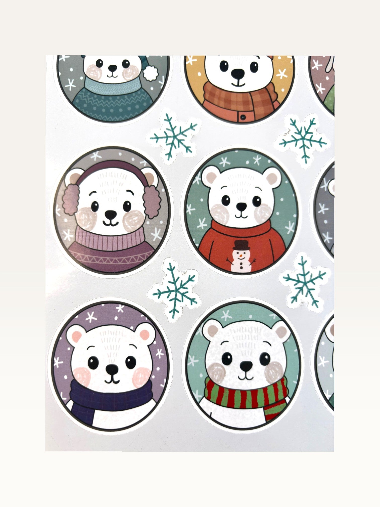 Paper Party Studio polar bear sticker sheet featuring nine cute bears in winter scarves and sweaters on glossy paper.