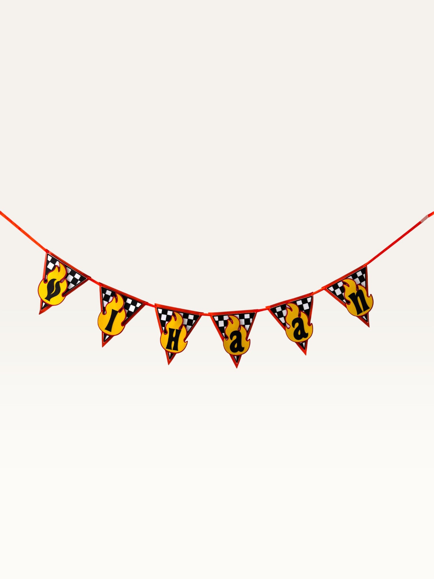 Paper Party Studio personalised race car birthday bunting with checkered flag pattern and yellow flame letter badges.