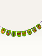 Paper Party Studio green paper banner for Janmashtami featuring gold Radha-Krishna, peacock feather, and kalash motifs