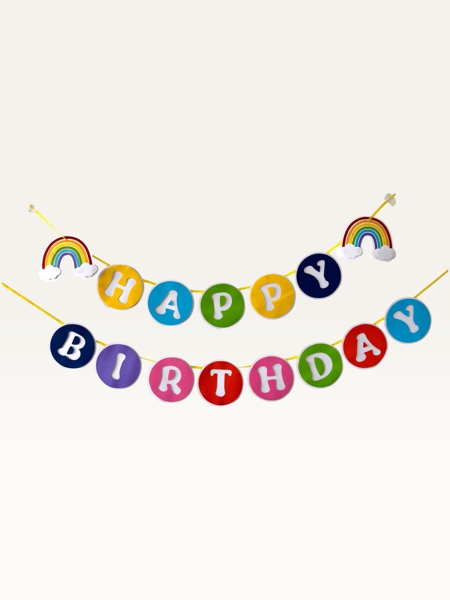 Paper Party Studio rainbow circle Happy Birthday banner with cloud accents on yellow string for kids party decor.