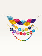 Paper Party Studio rainbow birthday banner set with paper fans, Happy Birthday bunting, and colourful scallop garland