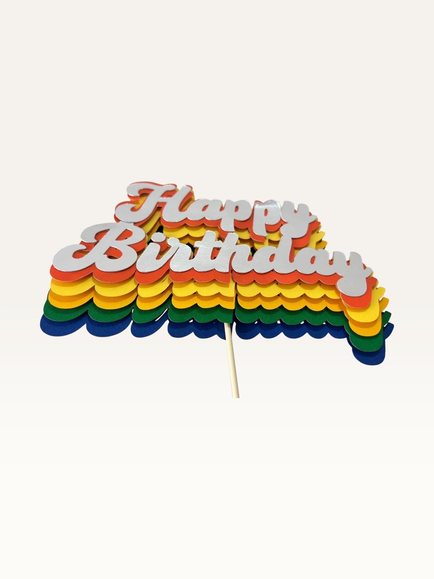 Paper Party Studio retro rainbow Happy Birthday cake topper with layered script lettering and silver top layer.