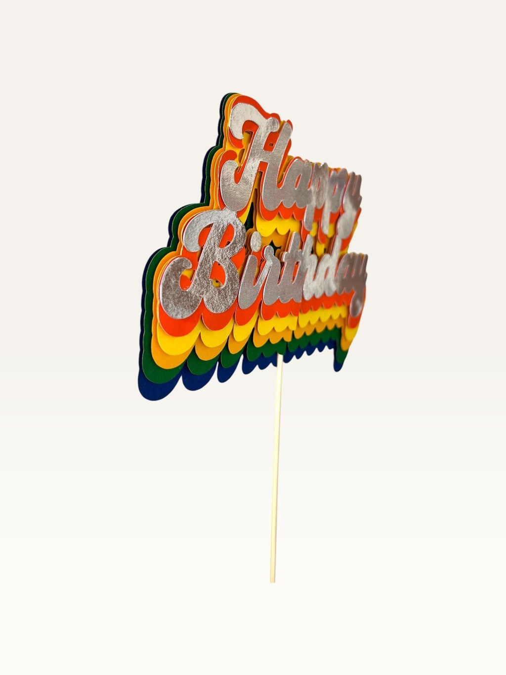 Paper Party Studio retro rainbow Happy Birthday cake topper with layered script lettering and silver top layer.