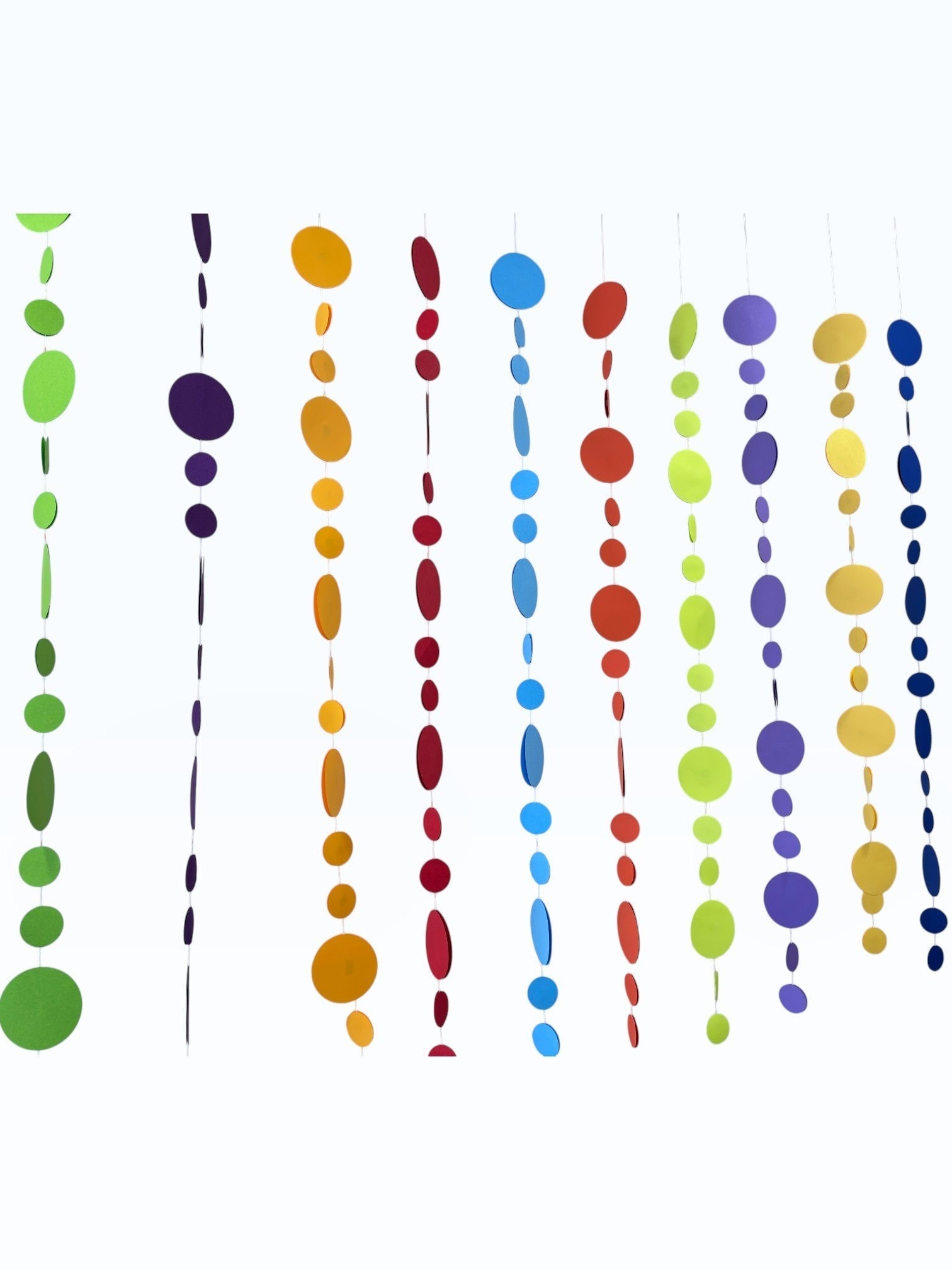 Paper Party Studio rainbow circle garland with 10 strings of graduated paper dots in vibrant colours.