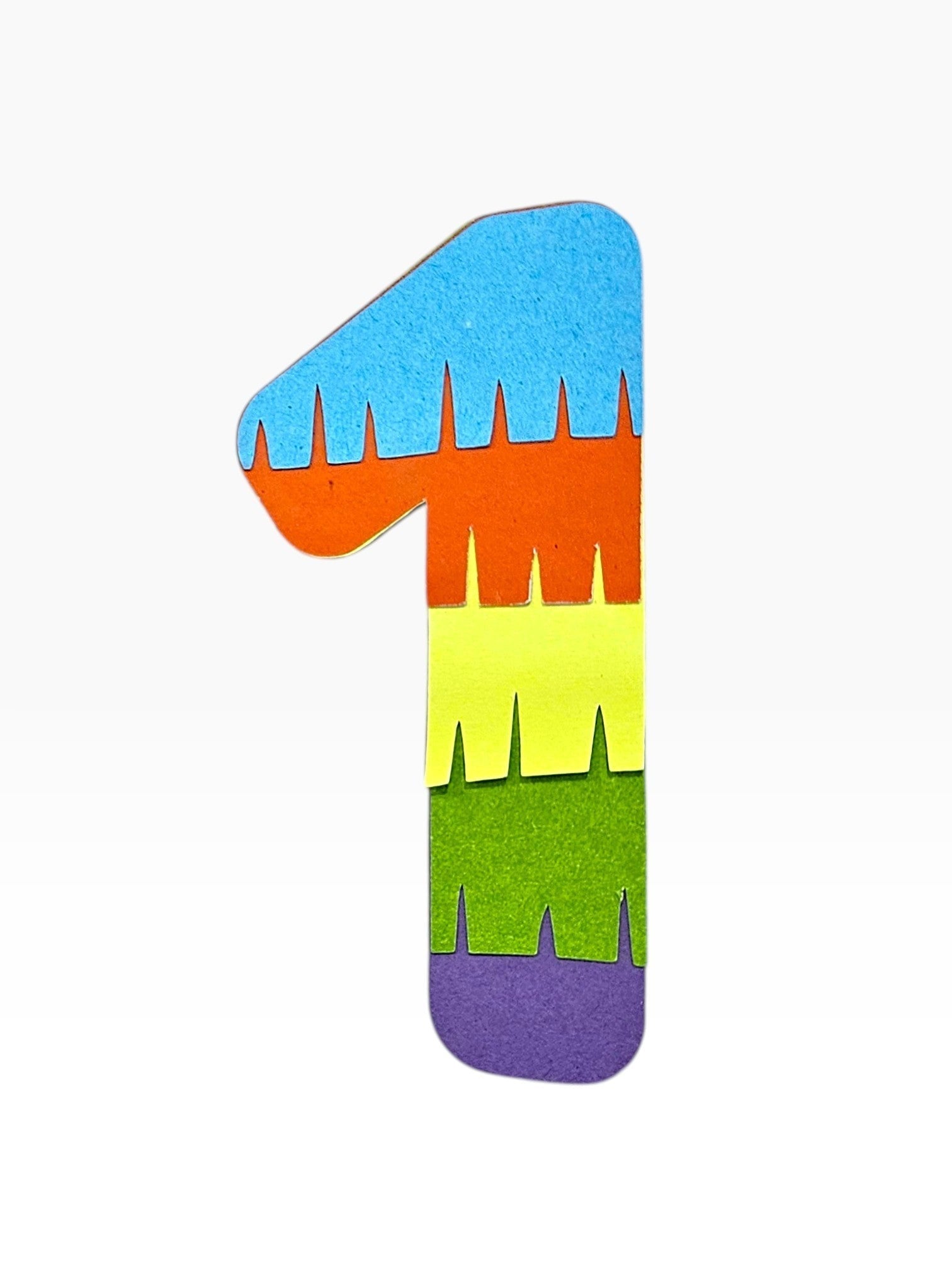 Paper Party Studio rainbow fringe number 1 cake topper, layered cardstock in blue, orange, yellow, green, and purple.