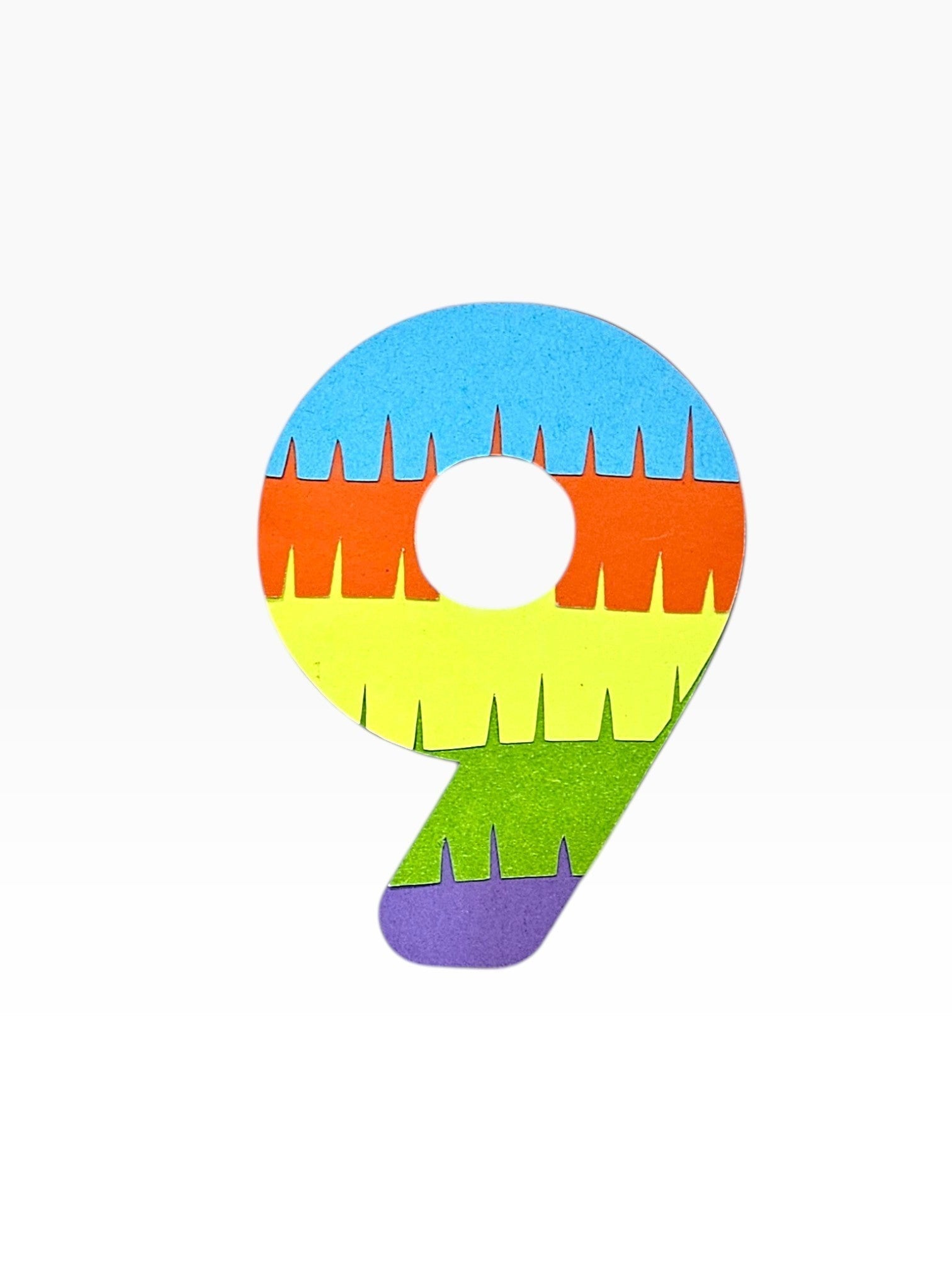 Paper Party Studio rainbow fringe number 9 cake topper, layered cardstock in blue, orange, yellow, green, and purple.