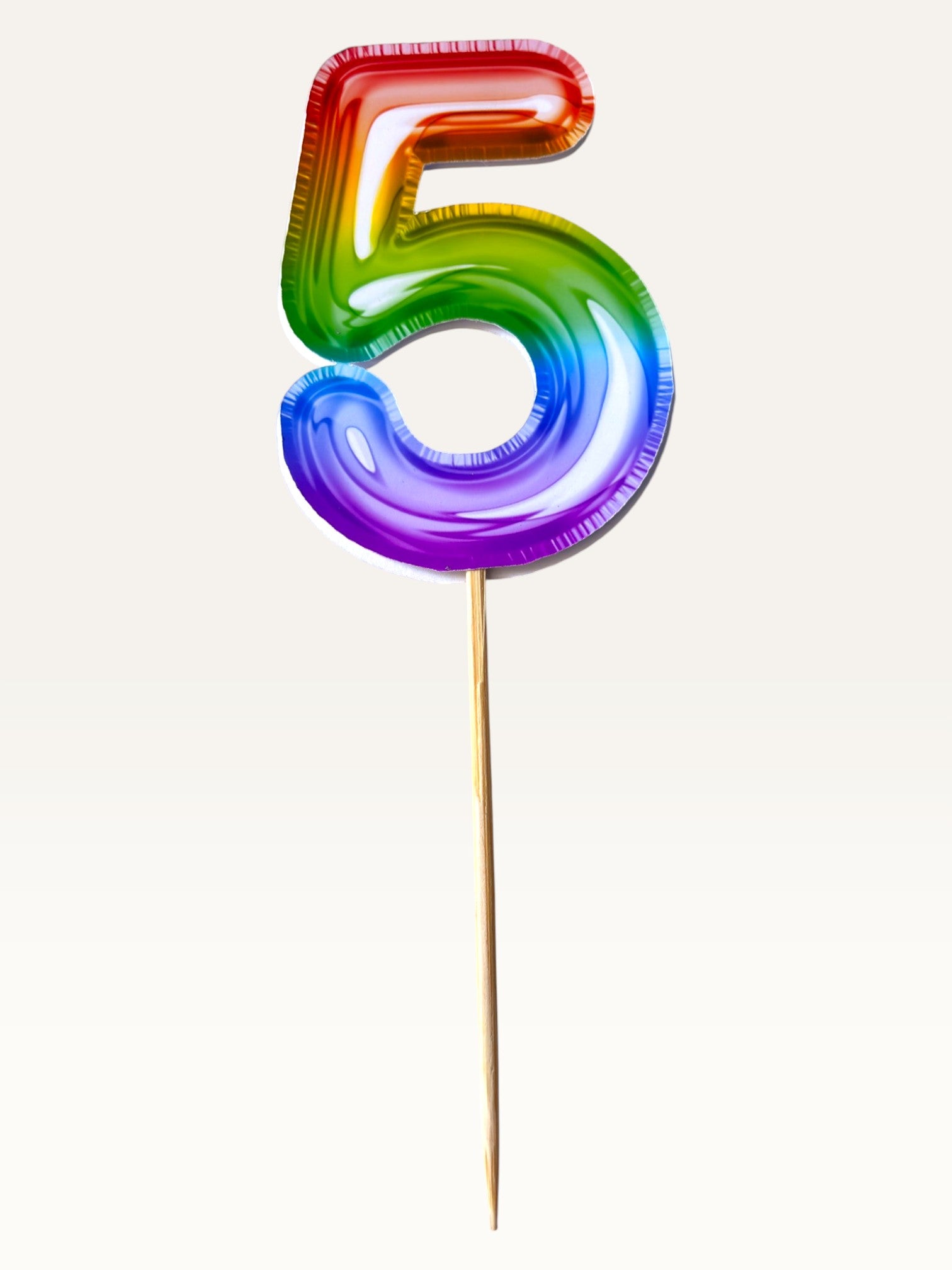 Paper Party Studio rainbow foil number five cupcake topper on a bamboo stick with double-sided metallic finish.