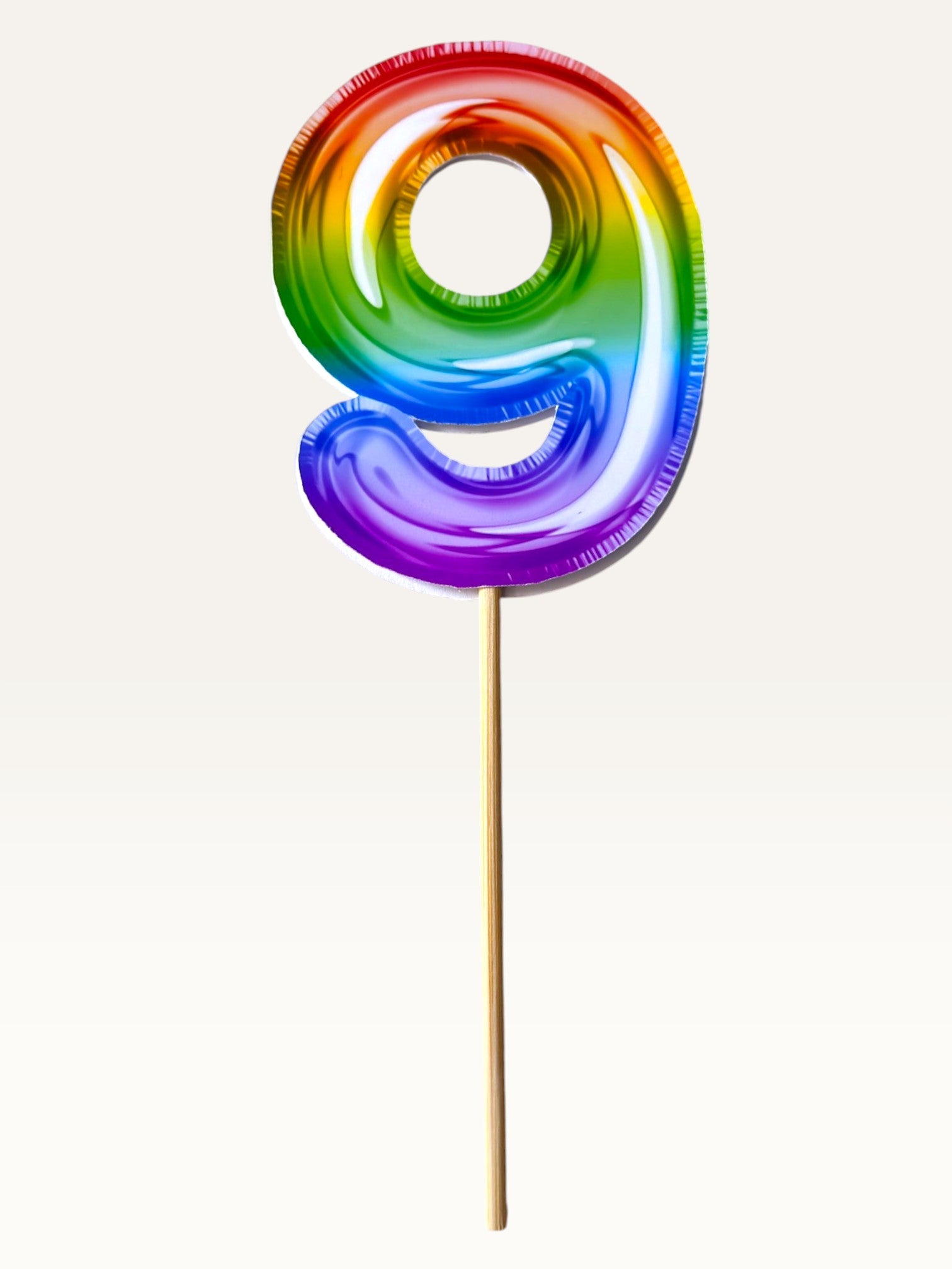 Paper Party Studio rainbow foil number nine cupcake topper on a bamboo stick with double-sided print