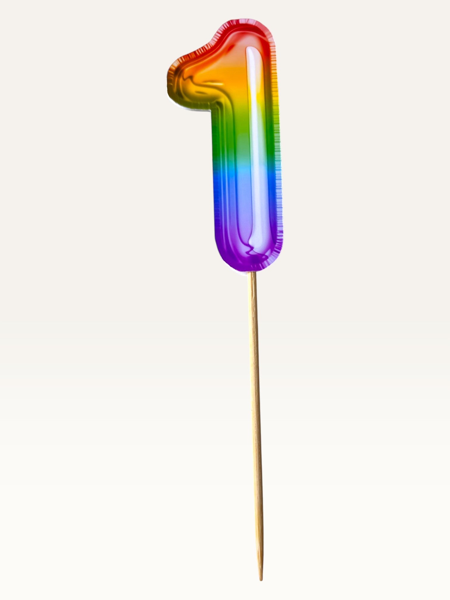 Paper Party Studio rainbow foil number one cupcake topper on a bamboo stick with double-sided print.
