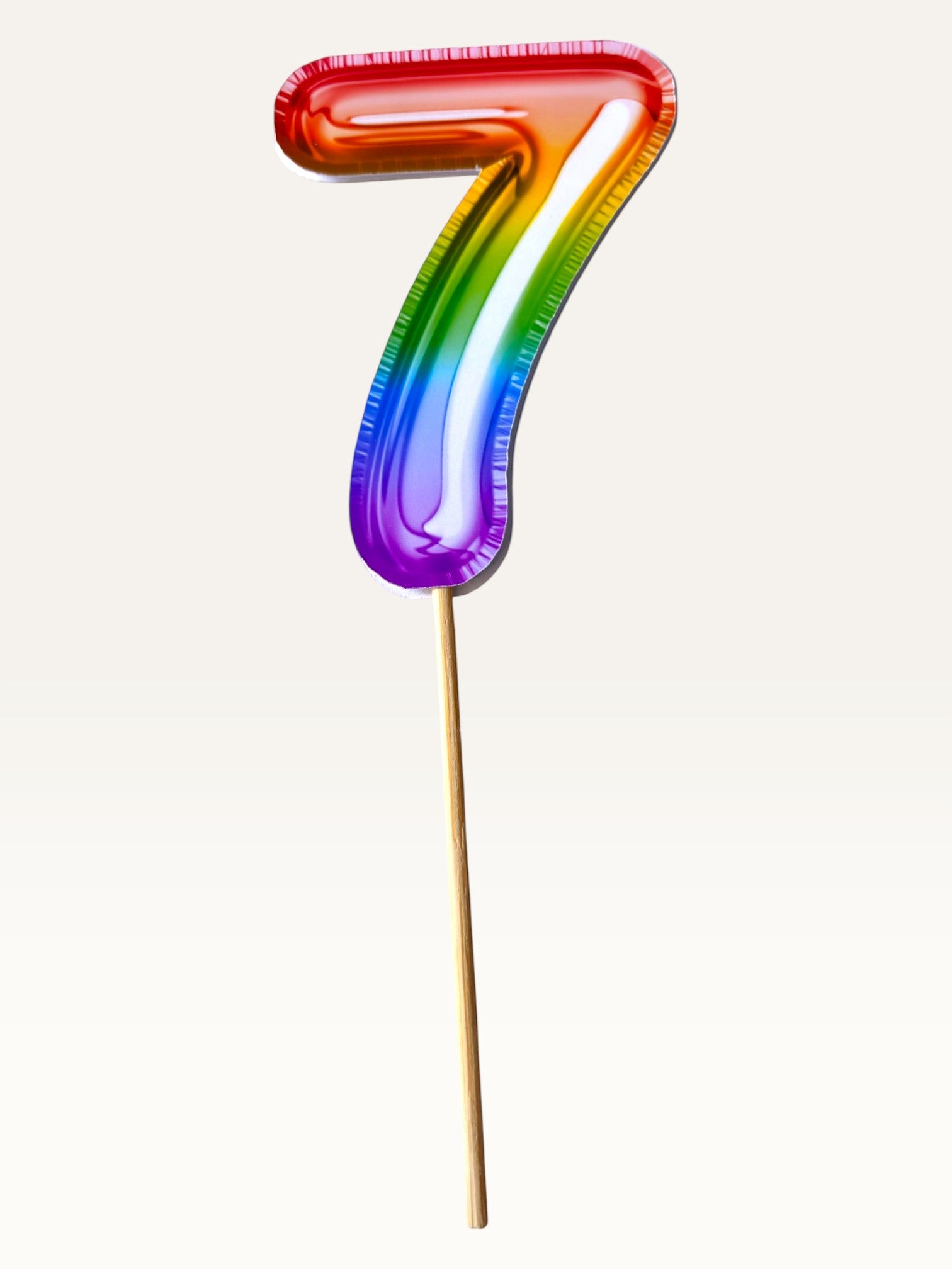 Paper Party Studio rainbow foil number seven cupcake topper on a bamboo stick with double-sided metallic finish