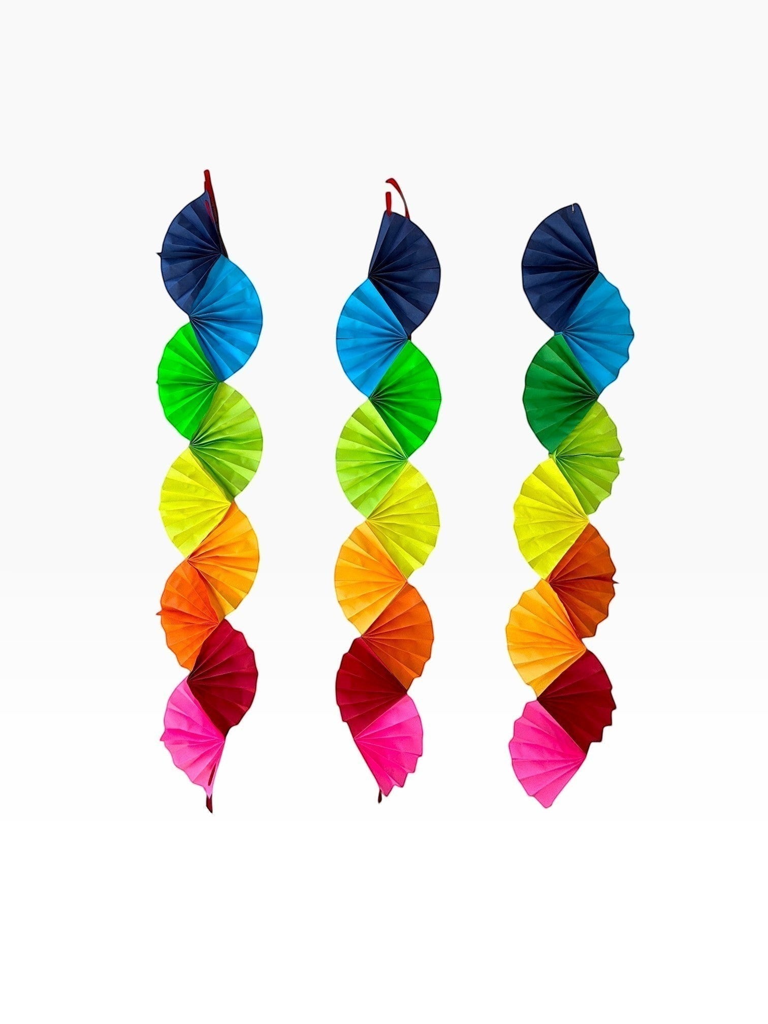 Paper Party Studio rainbow paper fan garland for party decorations, featuring vibrant cardstock folded wave design.
