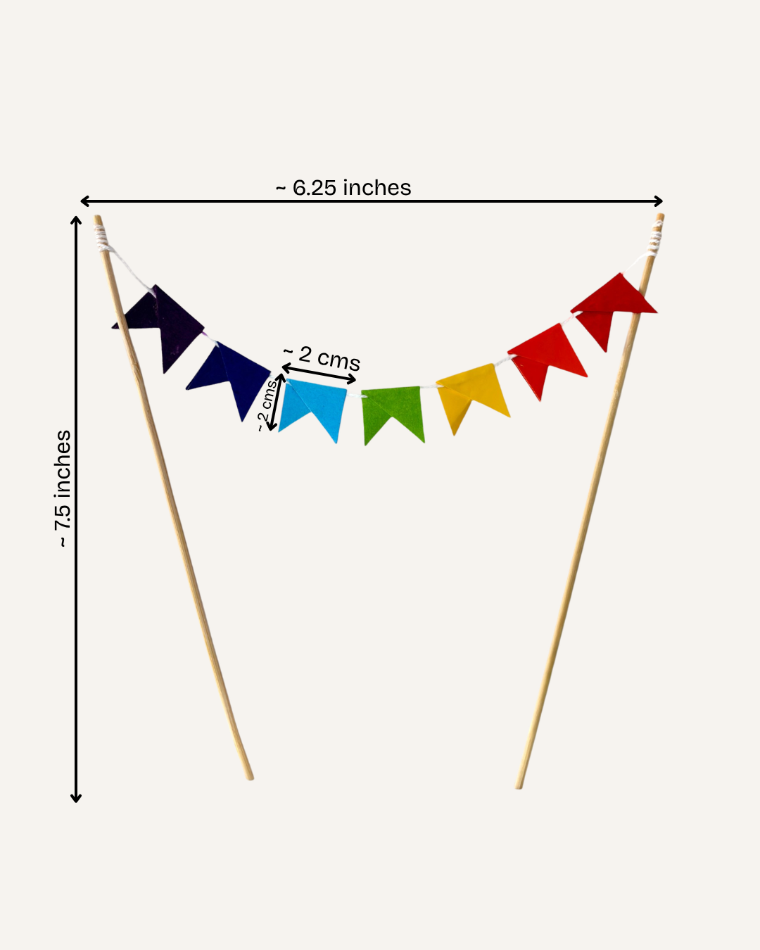 Paper Party Studio rainbow pennant cake topper with mini triangle flags in tissue paper