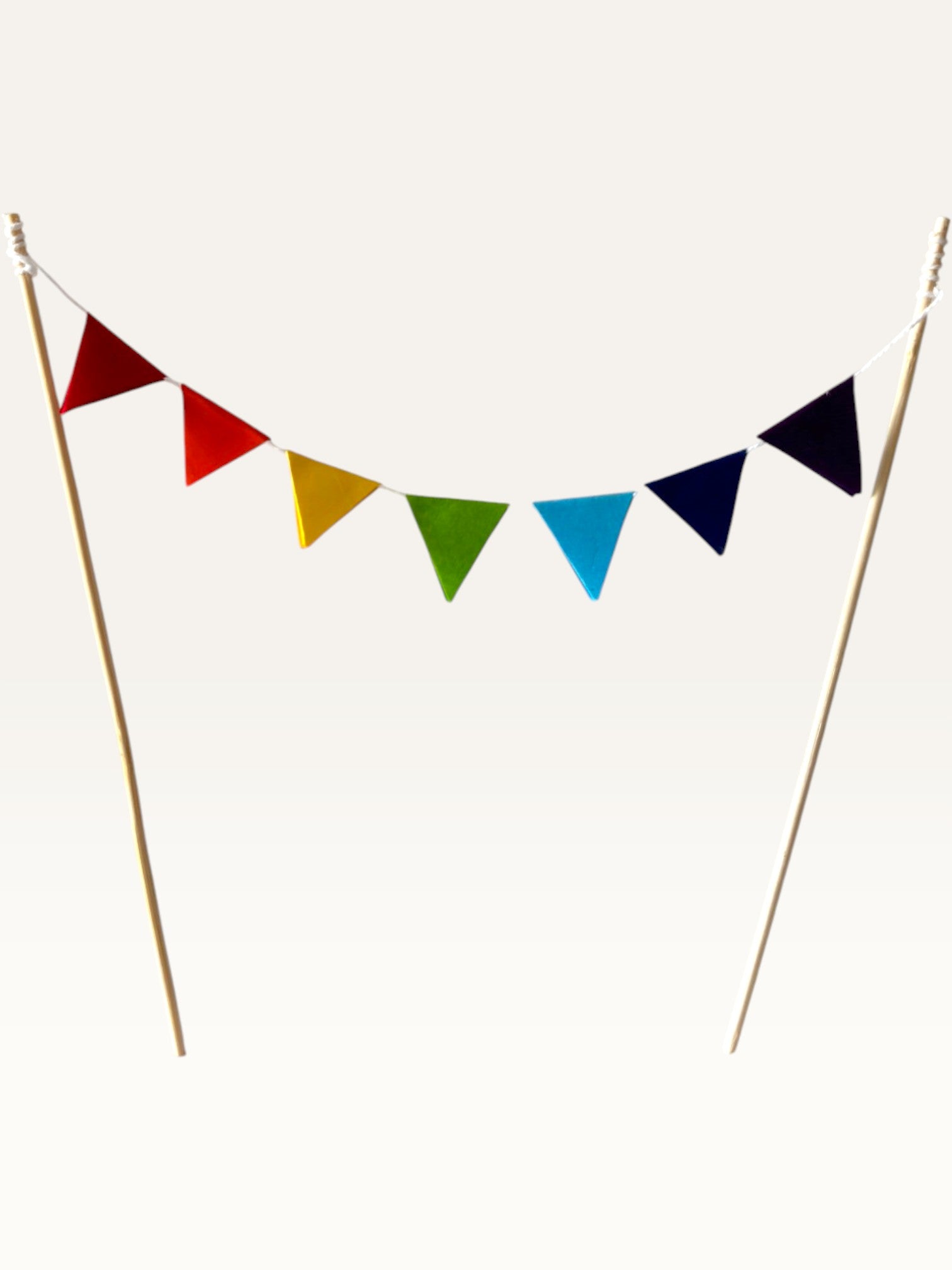 Paper Party Studio rainbow pennant cake topper with mini triangle flags on bamboo sticks for birthday cakes