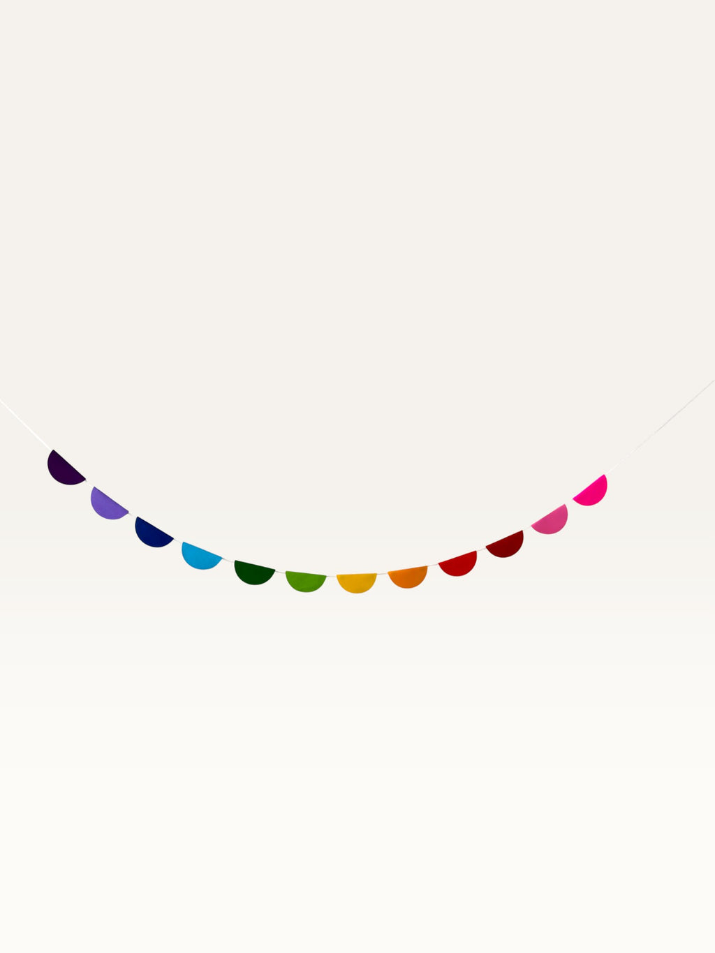 Paper Party Studio rainbow half-circle scallop string garland for unicorn themed birthday party decorations
