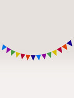 Paper Party Studio rainbow triangle bunting for birthday parties featuring vibrant multi-coloured paper flags