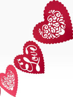 Paper Party Studio red heart bunting with floral cut-outs and "Love" script, perfect for Valentine's Day.
